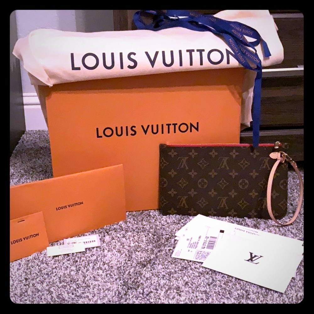 Authentic Louis Vuitton never full clutch with box